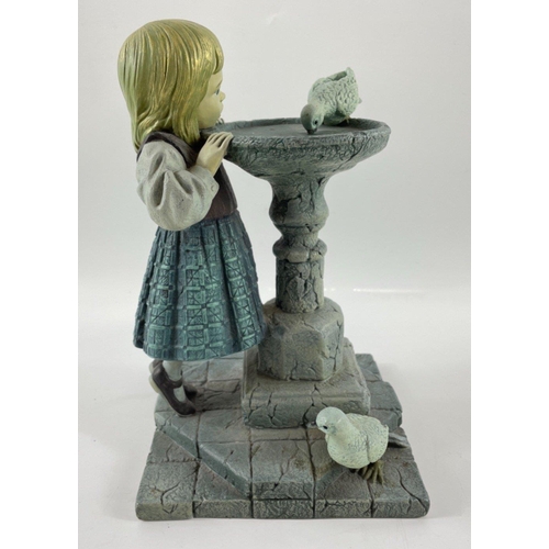 255 - An unusual ENESCO 1999 Piazza Making Friends figurine of a girl and pigeons, stands approx 25cm hi... 