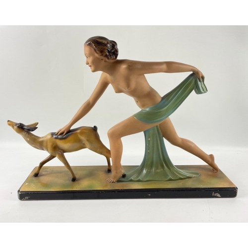 256 - A striking ART DECO style figural group of Diana the Huntress and a faun 58 x 40cm high#267