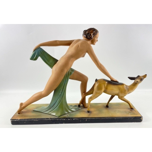 256 - A striking ART DECO style figural group of Diana the Huntress and a faun 58 x 40cm high#267