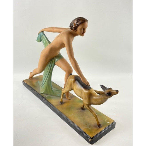 256 - A striking ART DECO style figural group of Diana the Huntress and a faun 58 x 40cm high#267