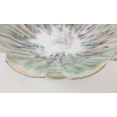 272 - A SCOTTISH STUDIO POTTERY hand painted medium sized raised bowl in pastel green white and red design... 