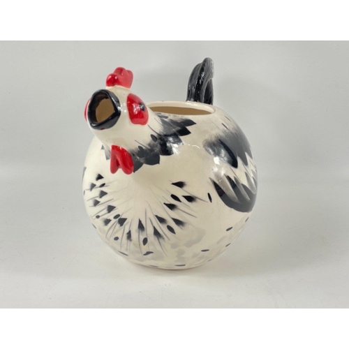 284 - Two prices of decorative China to include PORTMEIRION flora and fauna vase (H: 26cm) and R Roosters ... 