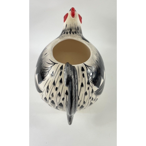 284 - Two prices of decorative China to include PORTMEIRION flora and fauna vase (H: 26cm) and R Roosters ... 