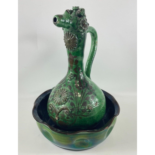 300 - A large dark green TORQUAY pottery ewer and bowl, ewer stands 40cm high and the bowl is 28cm dia, th... 