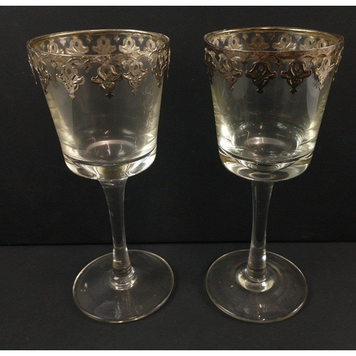 326 - UNUSUAL! A pair of white metal FRETWORK rimmed goblet style wine glasses - dimensions 18cm tall x 8c... 