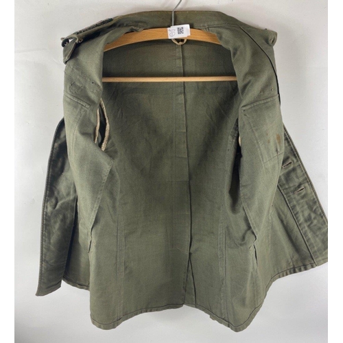 346 - RARE - A WWII German army artillery officer's summer tunic constructed of a lightweight grey cloth w... 