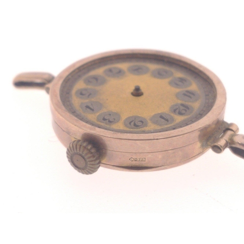 47 - A VINTAGE 9ct 375 stamped circular watch 2.5cm diameter and a 9ct marked expanding bracelet. Watch h... 