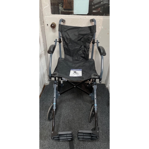 485 - A TRAVELITE CHAIR IN A BAG - a lightweight aluminium framed porterage wheelchair suitable for weight... 