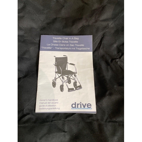 485 - A TRAVELITE CHAIR IN A BAG - a lightweight aluminium framed porterage wheelchair suitable for weight... 