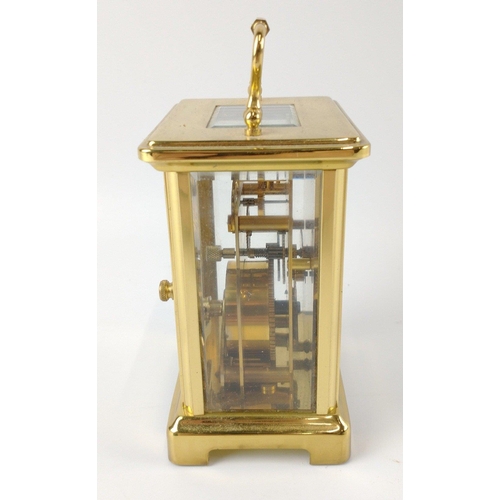 51 - A quality BAYARD French gilt brass and glass 8 day carriage clock with a white surface with black pa... 