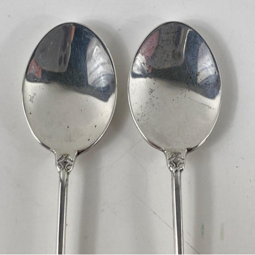 68 - A set of four Sheffield 1965 silver hallmarked teaspoons (gross weight 77.20gm), one Sterling Canada... 