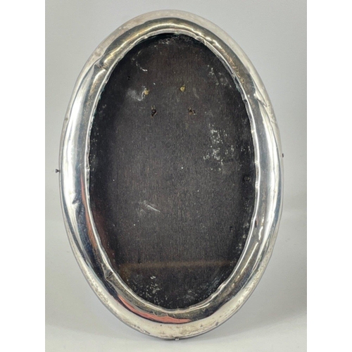 71 - Two oval shaped Birmingham, 1926, hallmarked photo frames gross weight 198gms#76