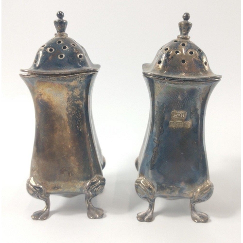 72 - A silver Birmingham Hallmarked 1925 WALKER and HALL Cruet set, most with blue glass liners(one missi... 