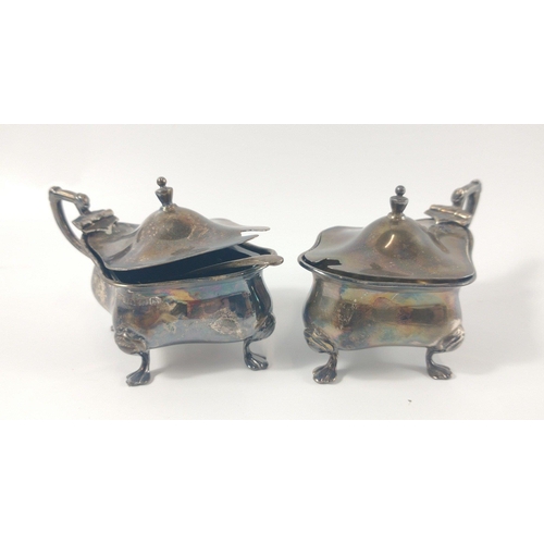 72 - A silver Birmingham Hallmarked 1925 WALKER and HALL Cruet set, most with blue glass liners(one missi... 