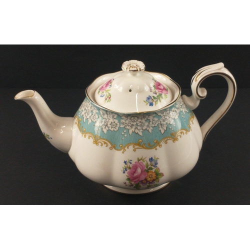 93 - A collection of ROYAL ALBERT 'Enchantment' tea service to include a large teapot and 12 cups and 40 ... 