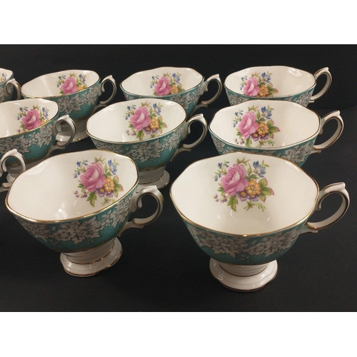 93 - A collection of ROYAL ALBERT 'Enchantment' tea service to include a large teapot and 12 cups and 40 ... 