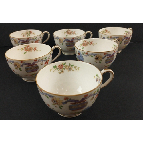 96 - A ROYAL WORCESTER tea set c 1922 to include 12 cups, 11 side plates, 2 cake plates, 12 cups and sauc... 