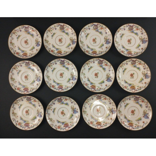 96 - A ROYAL WORCESTER tea set c 1922 to include 12 cups, 11 side plates, 2 cake plates, 12 cups and sauc... 