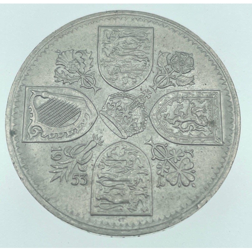 28B - Four COMMEMORATIVE coins to include two Five Shilling pieces, 1951  and a 1953 piece, a 1977 Silver ... 