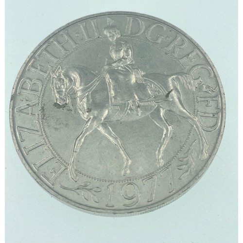 28B - Four COMMEMORATIVE coins to include two Five Shilling pieces, 1951  and a 1953 piece, a 1977 Silver ... 