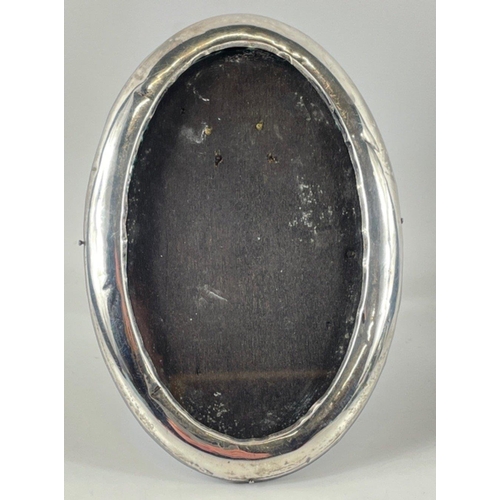37 - Two oval shaped Birmingham, 1926, hallmarked photo frames gross weight 198gms#42