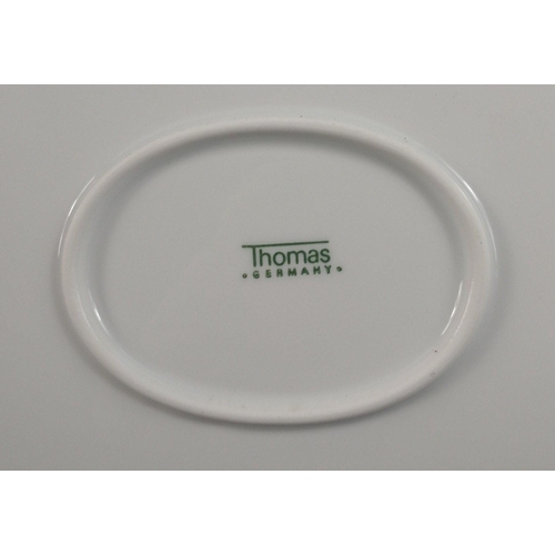 45 - Quality THOMAS of GERMANY with silver rim china to include three ashets each 33cm long, 1 lidded veg... 