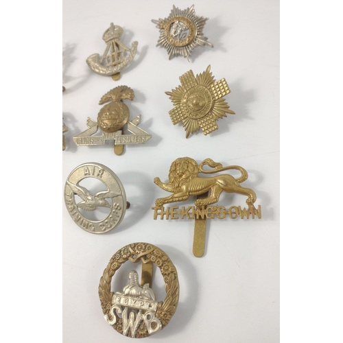 106 - Twelve British military cap badges to include the 3rd KING'S OWN HUSSARS, ROYAL WEST, DURHAM LIGHT I... 