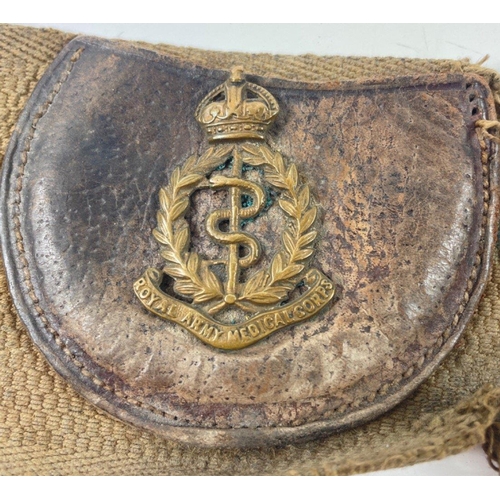 113 - A WWl belt with 15 badges and buttons including SCOTTISH HORSE, ROYAL ARMY MEDICAL CORPS, ARGYLL AND... 