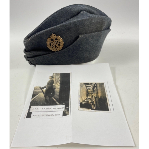 118B - An RAF side cap,from the 1939, . Badge and crown buttons in place. The length of the cap, from front... 