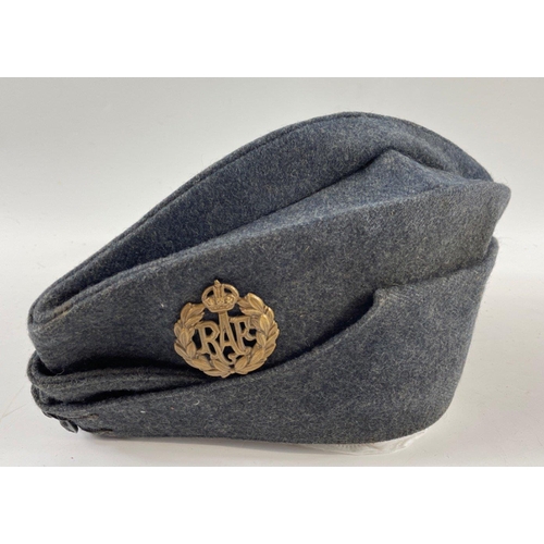 118B - An RAF side cap,from the 1939, . Badge and crown buttons in place. The length of the cap, from front... 