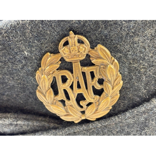 118B - An RAF side cap,from the 1939, . Badge and crown buttons in place. The length of the cap, from front... 