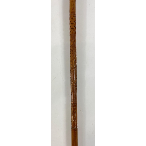 139 - A rather fine WWl carved walking stick 90cm long#142