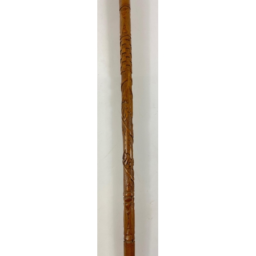 139 - A rather fine WWl carved walking stick 90cm long#142