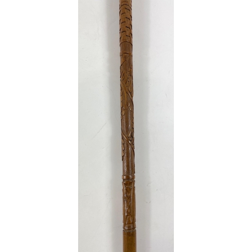 139 - A rather fine WWl carved walking stick 90cm long#142