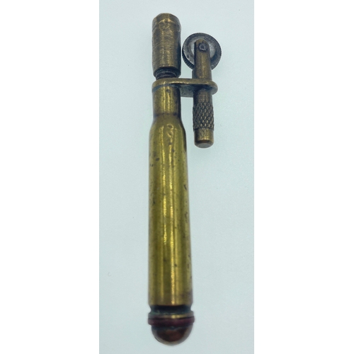 146 - Two examples of TRENCH ART LIGHTERS, the first being WWl brass and the second being post-WWll white ... 