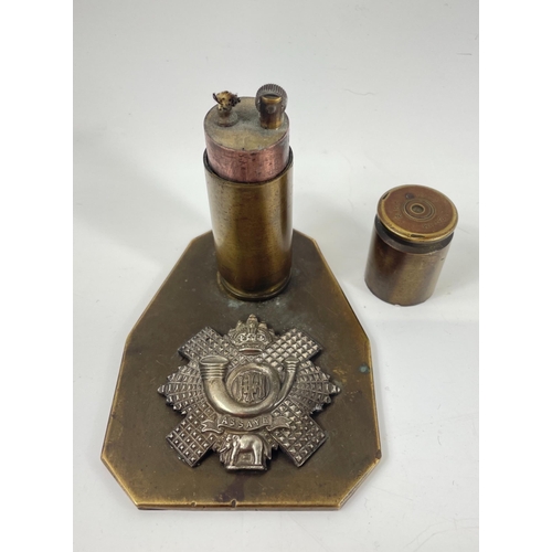 156 - A WW2 1942 TRENCH ART table cigarette lighter made of a brass bullet on a brass stand with British A... 