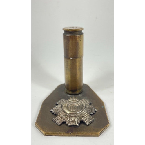 156 - A WW2 1942 TRENCH ART table cigarette lighter made of a brass bullet on a brass stand with British A... 