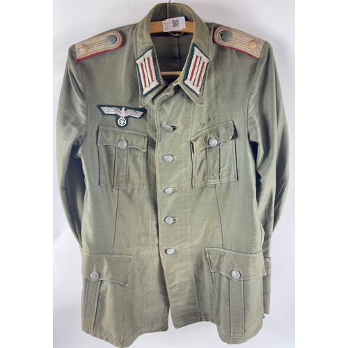 160 - RARE - A WWII GERMAN army artillery officer's summer tunic constructed of a lightweight grey cloth w... 