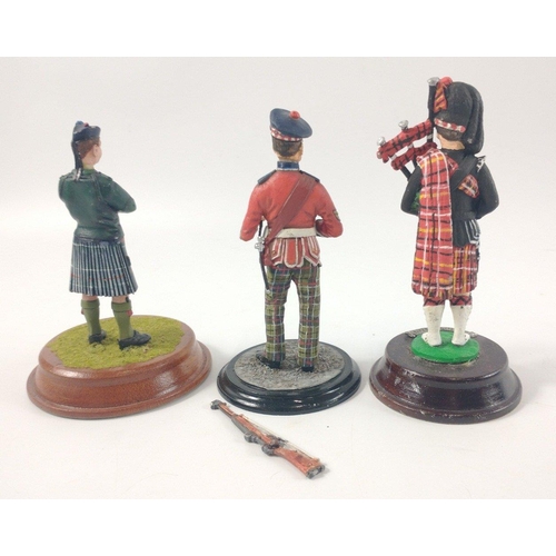 167 - Three hand-painted metal Scottish soldiers to include a BLACK WATCH PIPER (11cm tall), and 2 others#... 