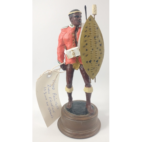 168 - A hand-painted ZULU soldier on stand 24cm high by Peter Hicks#171