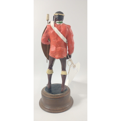 168 - A hand-painted ZULU soldier on stand 24cm high by Peter Hicks#171