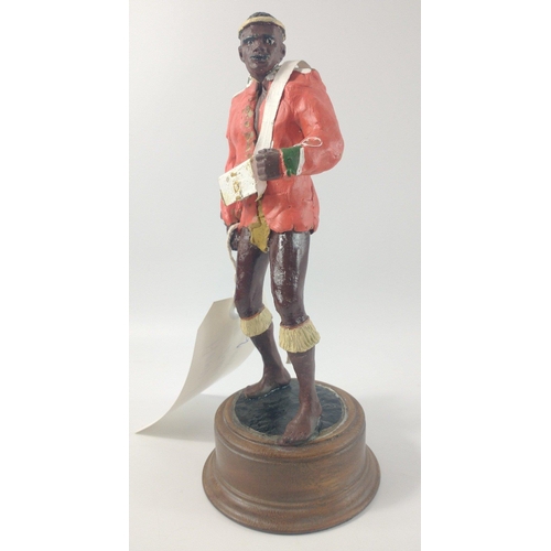 168 - A hand-painted ZULU soldier on stand 24cm high by Peter Hicks#171