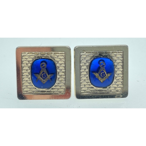 175 - A collection of MASONIC items to include white metal Masonic Emblem cufflinks and a masonic button p... 