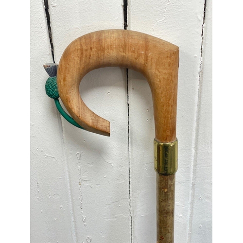 177 - A HANDMADE in the Scottish Borders a sheherd's CROOK style walking stick with a feature THISTLE embl... 