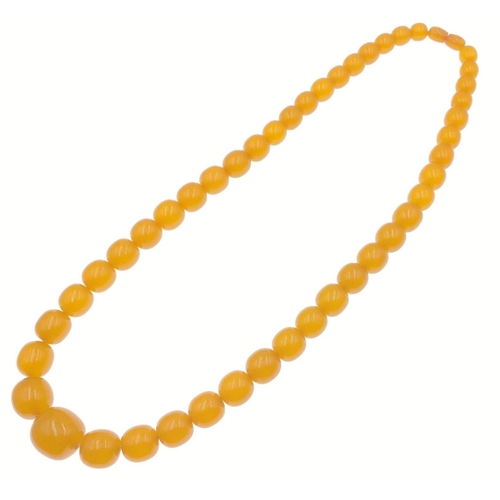 18 - A strand of VINTAGE AMBER BEADS! This wonderful necklace is comprised of vibrant amber beads, which ... 