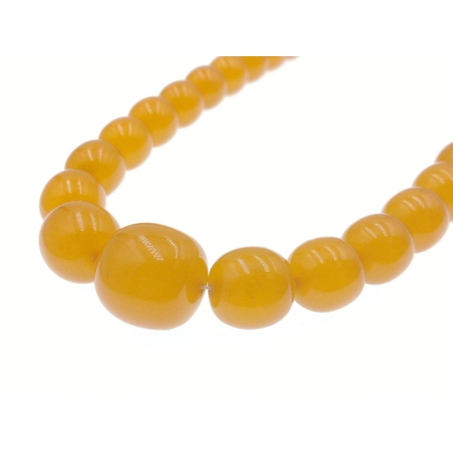 18 - A strand of VINTAGE AMBER BEADS! This wonderful necklace is comprised of vibrant amber beads, which ... 