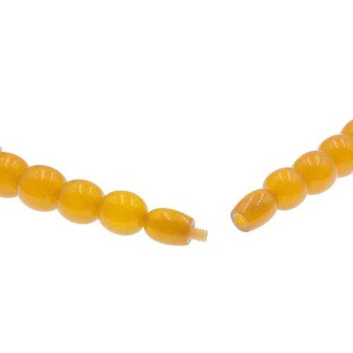 18 - A strand of VINTAGE AMBER BEADS! This wonderful necklace is comprised of vibrant amber beads, which ... 