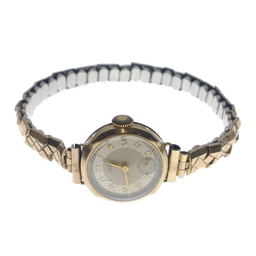 57 - A vintage JNO ladies 375 gold stamped cased yellow gold wrist watch with a rolled gold expanding bra... 