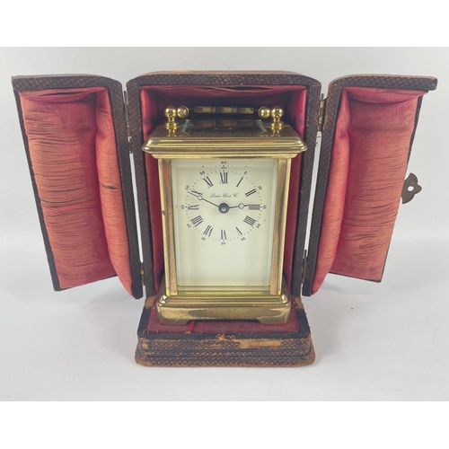 60 - A LONDON CLOCK CO brass travelling clock presented to the Officers Mess of 4 Armd Div. Tpt. Regt RCT... 