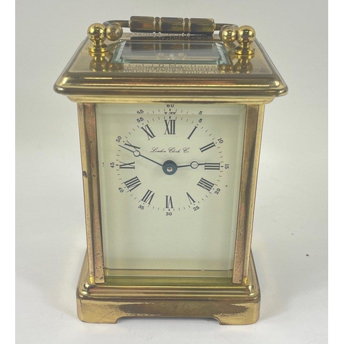 60 - A LONDON CLOCK CO brass travelling clock presented to the Officers Mess of 4 Armd Div. Tpt. Regt RCT... 